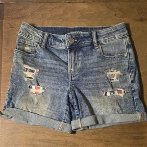 Maurices Blue Distressed Denim Shorts with Flag Patch Details
